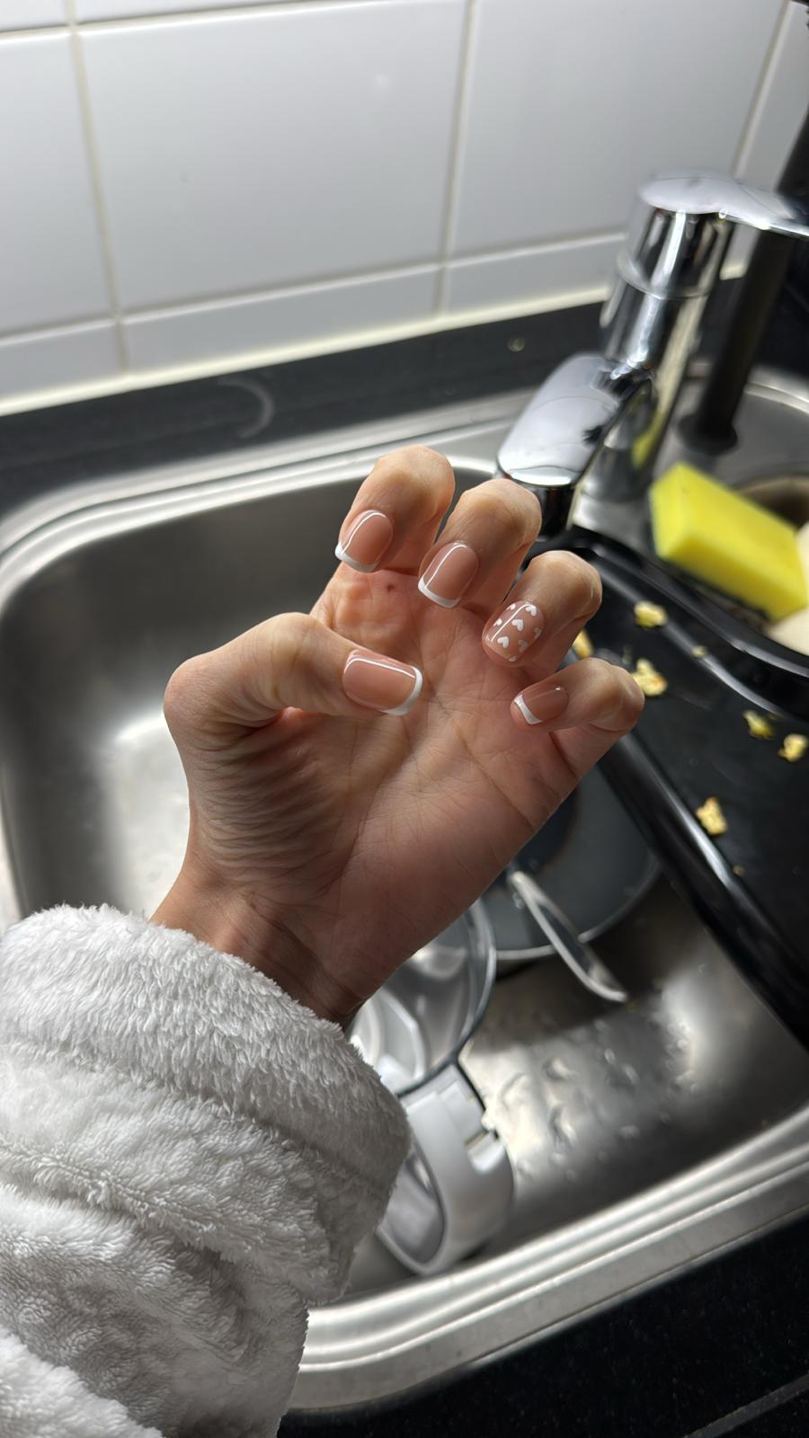 Custom nail design - french tips with hearts